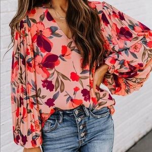 New with tags. Cute flowy shirt!